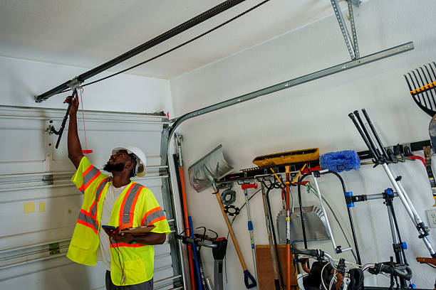 Professional Garage Door Panel Replacement technician working in Powells Crossroads, TN